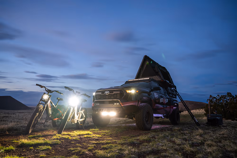 2024 Toyota Tacoma with two off road e-bikes, a pop-up tent and $5,000 cash